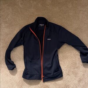 Patagonia men’s  Navy Jacket with Bright Orange Trim